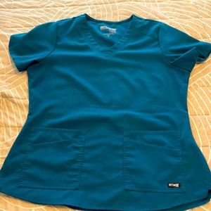 Teal scrub top. Used a couple of times.